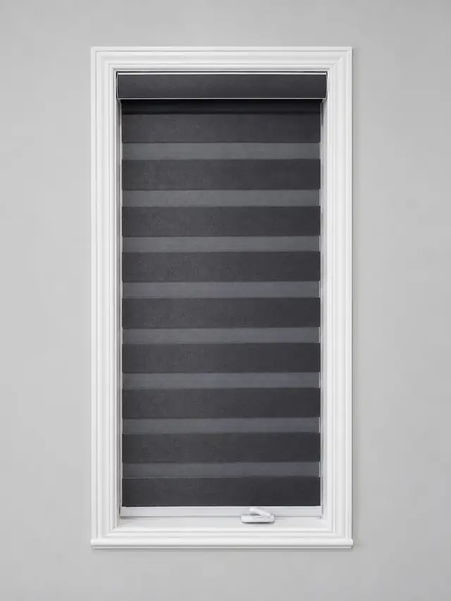 Charcoal zebra blind on a tall narrow window